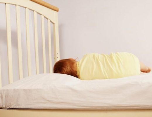 Toddler asleep on Roly Poly pillow