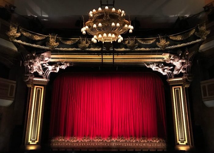 Theatre front with red curtains